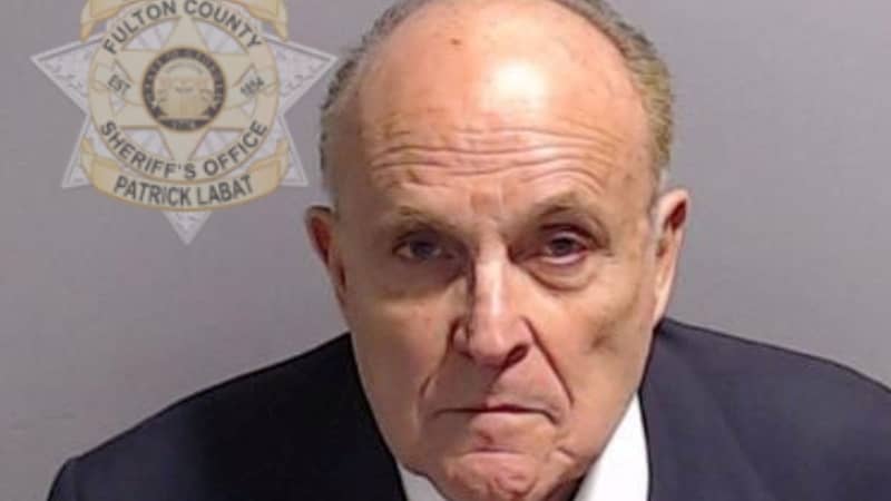 Rudy Giuliani’s Mugshot Taken as He Turns Himself In Over Election-Related Charges